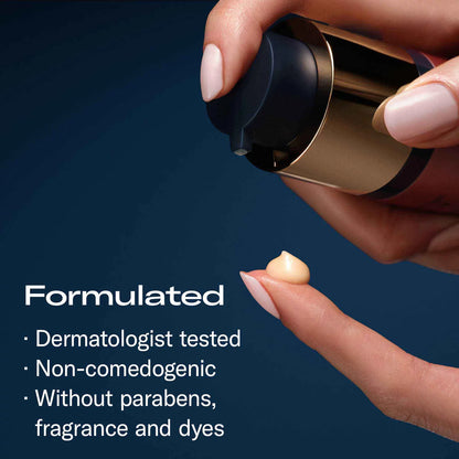 A hand pumps a beige cosmetic cream onto another hand from a gold and black pump bottle, with text reading 'Formulated' and bullet points about dermatologist testing, non-comedogenic formula, and no parabens, fragrance, or dyes.